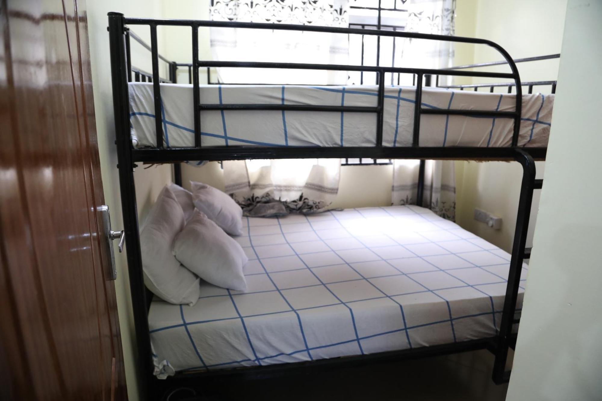 Pearl Lulu Modern Bnb Homestay Дар-эс-Саламе Номер фото